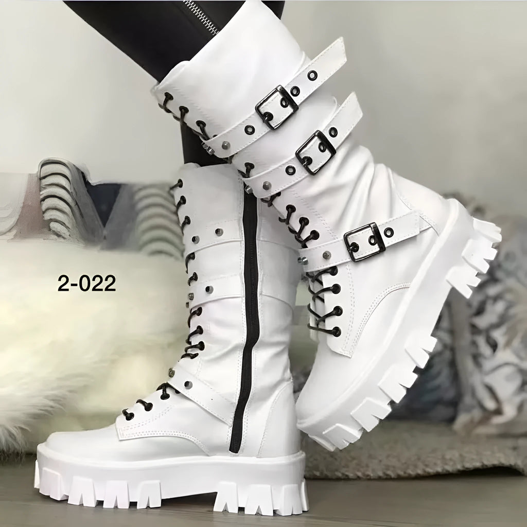 Black mid-calf women's boots with a large metal buckle and side zip on a white background.