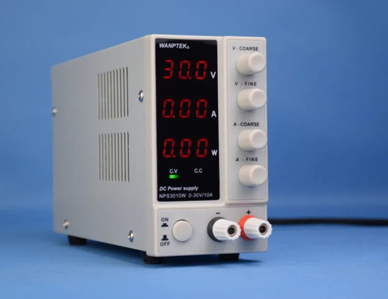 White adjustable DC power supply unit with voltage and current controls for electronics testing