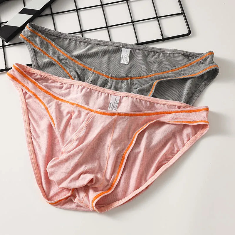 Men's modal hip-lift underwear in dark grey, shown flat.