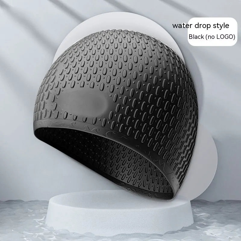 Silicone swimming cap with water drop design in choice of nine solid colours for adult swimmers