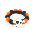 Halloween pet collar with fur ball decoration in orange pumpkin design