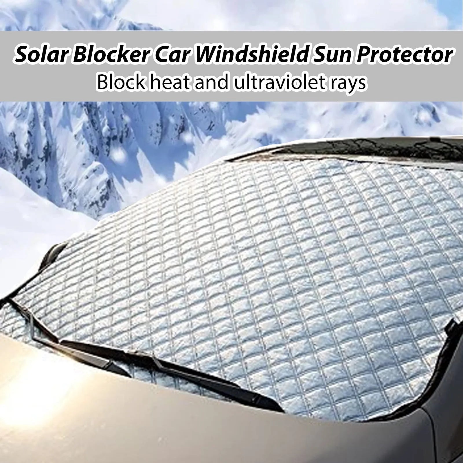 Car windscreen frost cover made of silver aluminium film and nylon fabric, laid flat showing its rectangular 140cm x 95cm size.
