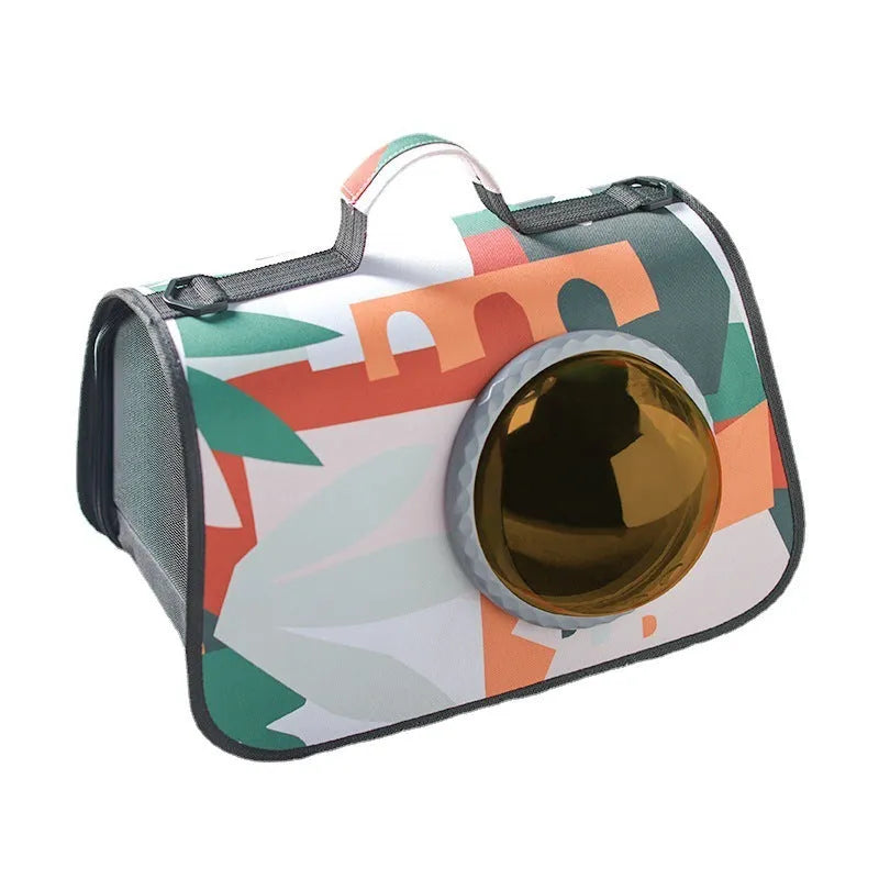 Cat travel bag with transparent space cover, crossbody strap, and cartoon pattern in green leaves design