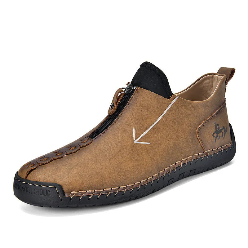 Men's brown casual leather-style boots with a front zip, round toe, and mid-calf height.