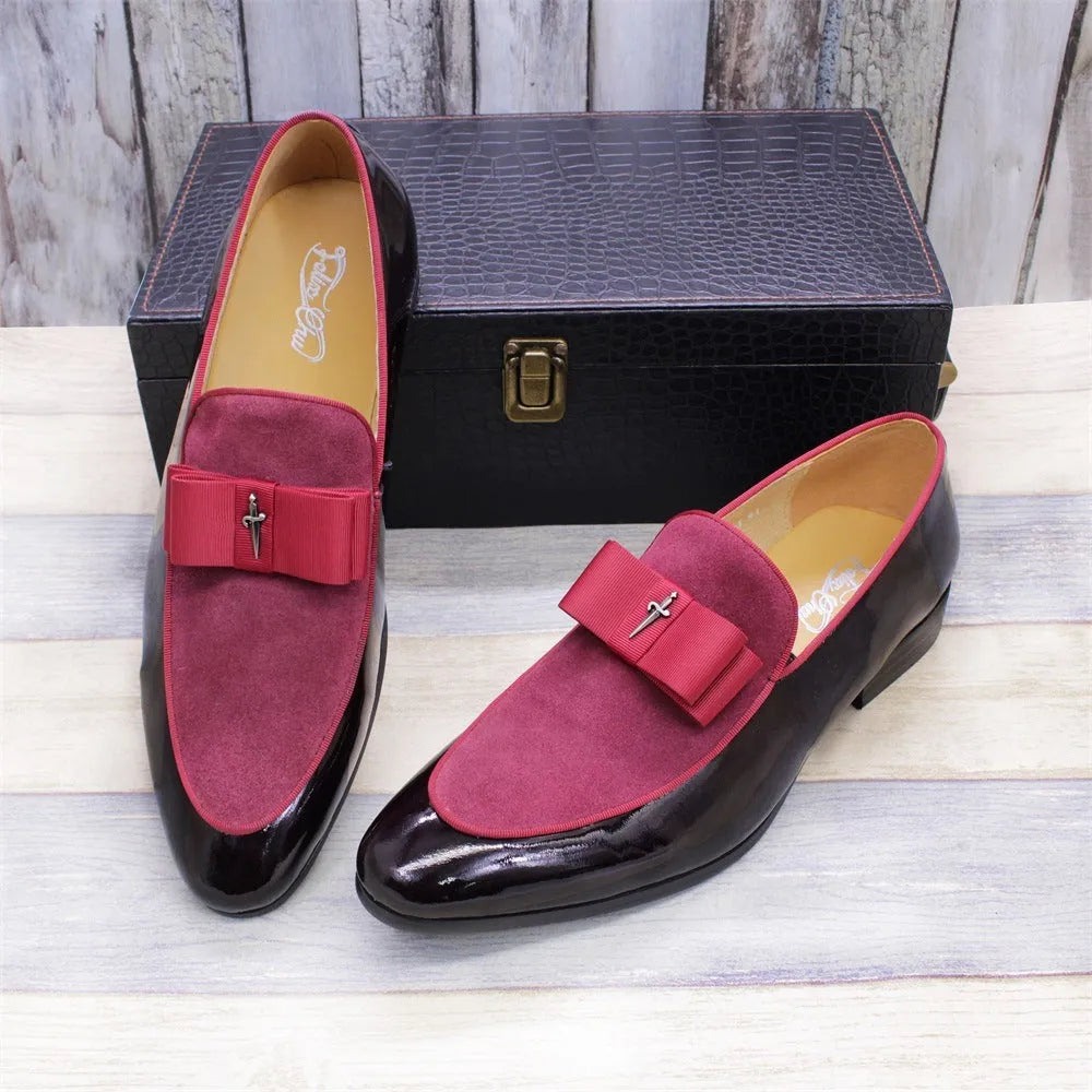 Men's glossy patent leather dress shoes with tassel detail in black, showing low-top design and leather toe holder.