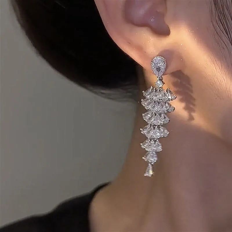Silver pagoda Christmas tree drop earrings with sparkling zircon elements on copper construction