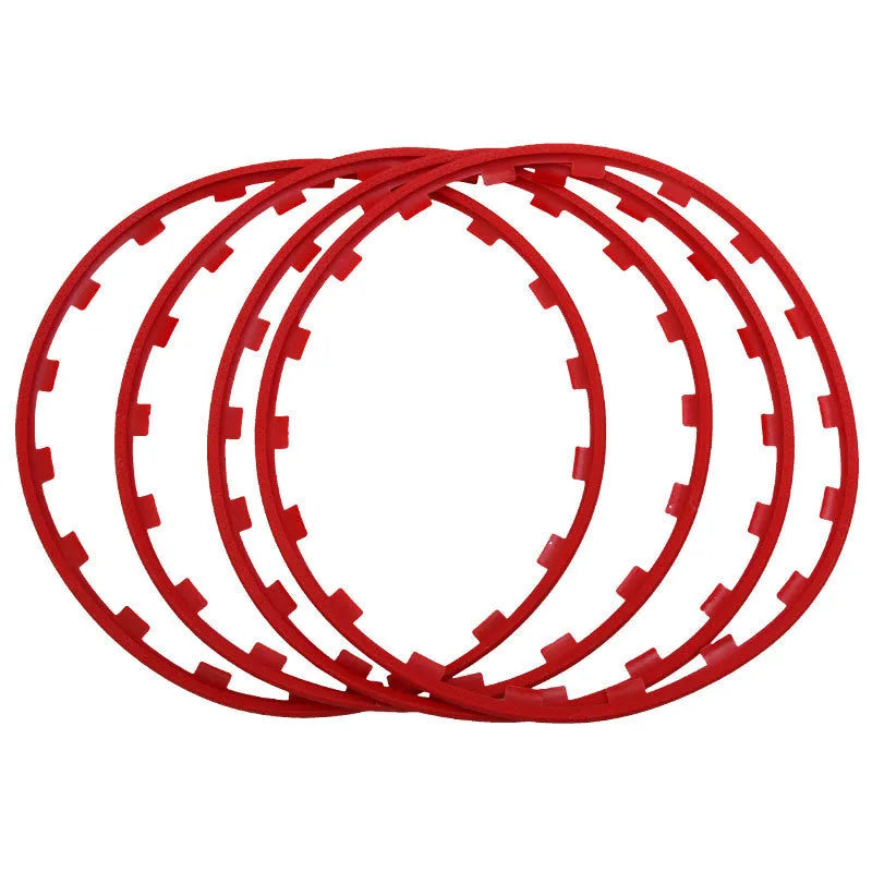Set of four coloured nylon wheel hub guard rings in sizes 16 to 20 inches.
