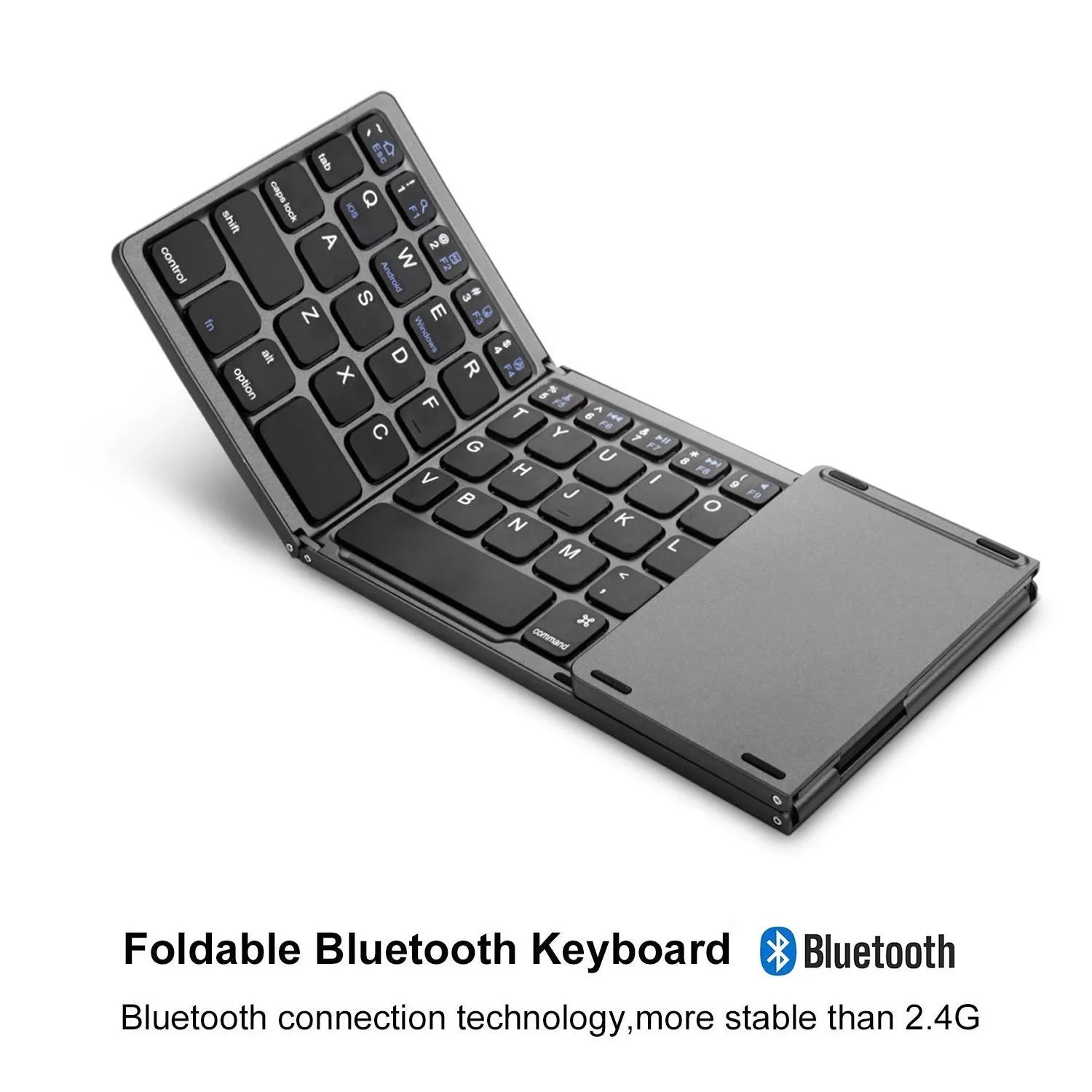 Black tri-fold portable Bluetooth keyboard shown open next to a smartphone, highlighting its slim profile.