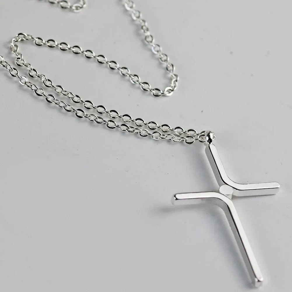 Titanium steel cross pendant necklace with inlaid gold finish and water wave chain, silver colour option
