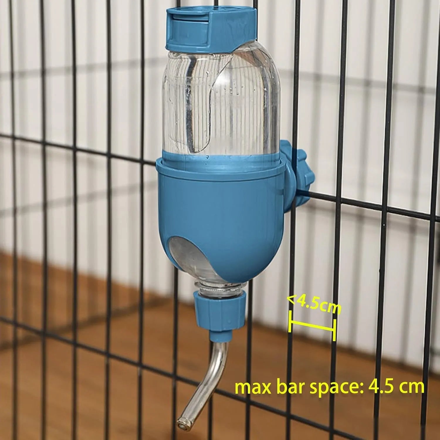 Blue pet water bottle with rotating nozzle mounted on cage bars for small animals
