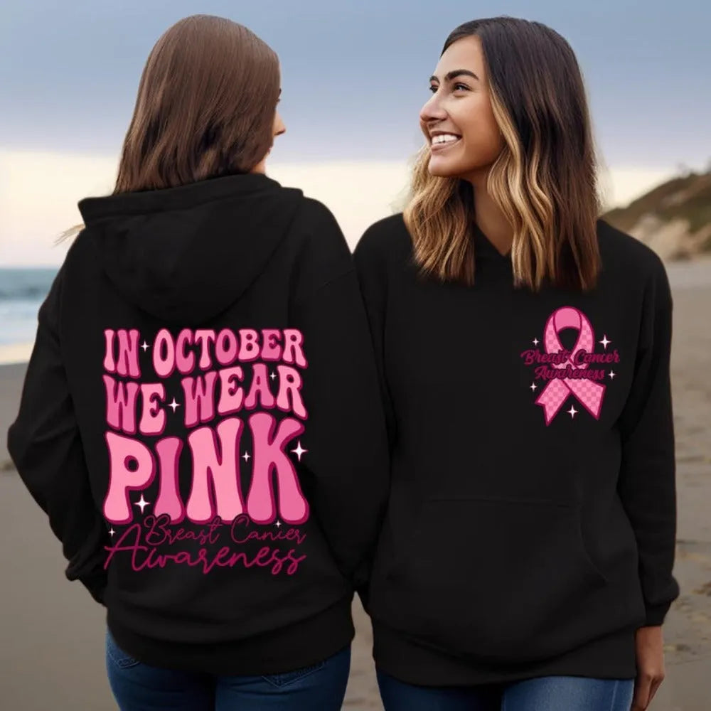 Pink women's hoodie with retro breast cancer awareness hot stamp design and side seam pocket.