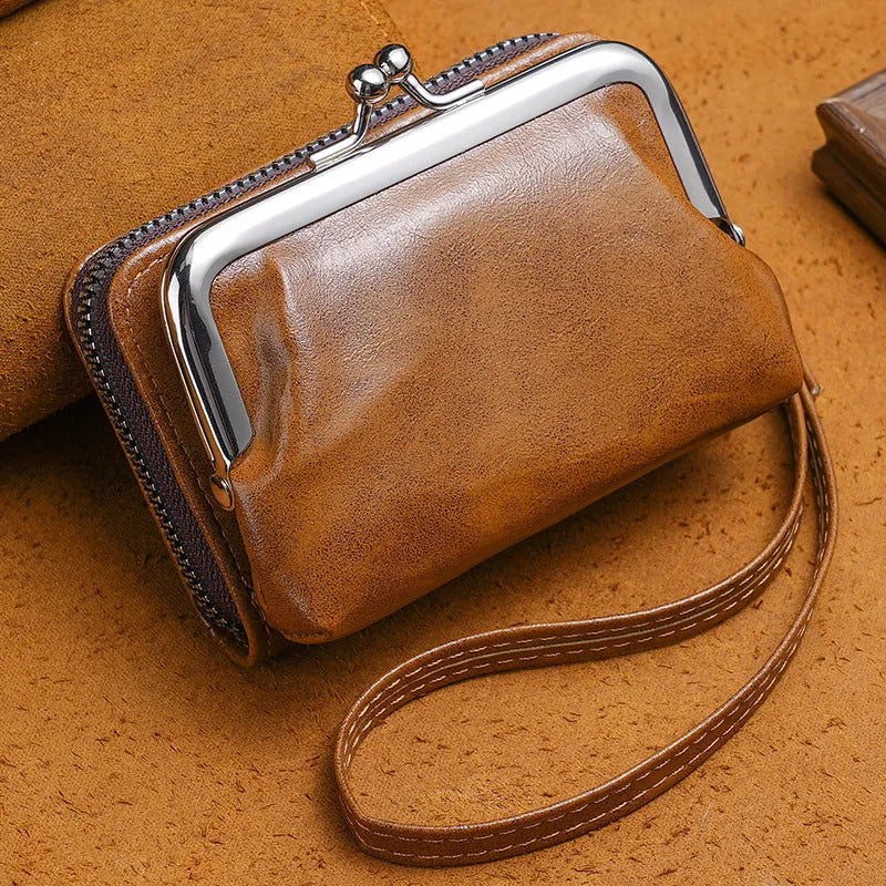 Ladies leather coin purse with a metal buckle clip, shown in coffee colour