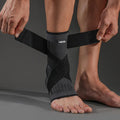 Ankle support sports pressure brace in black for basketball and running, single pack size M