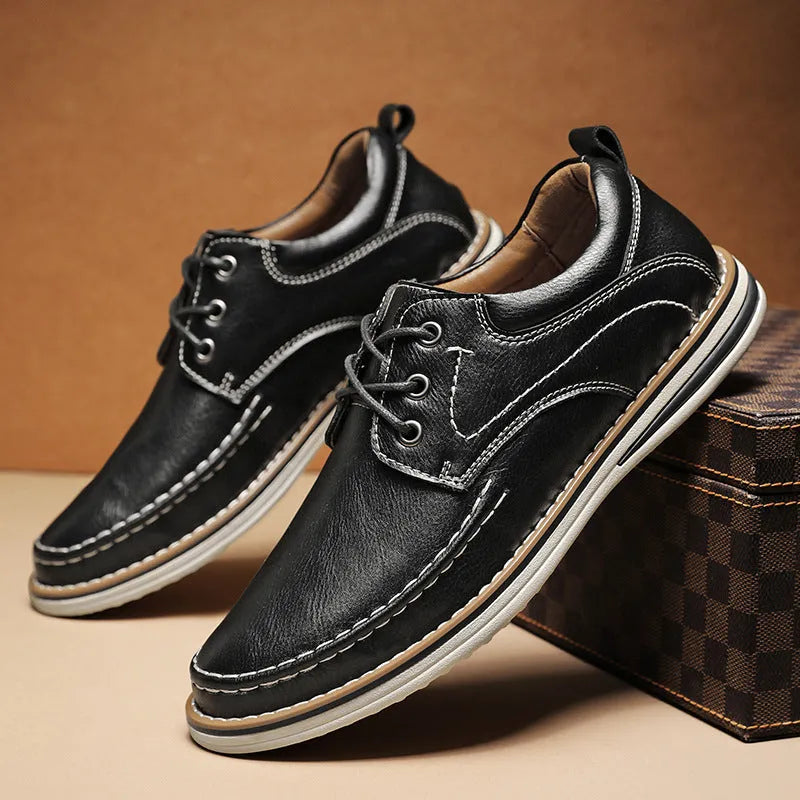 Men's black genuine leather casual lace-up shoes with round toe and low heel on a rubber sole