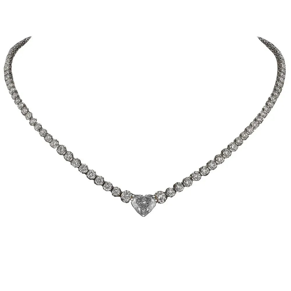 Heart pendant necklace with rhinestone crystal on a 41-50cm box chain, available in gold or silver finish.