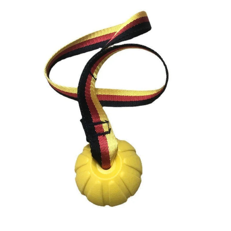 Yellow and camouflage coloured EVA floating knot balls for dogs in three different sizes on a blue background.