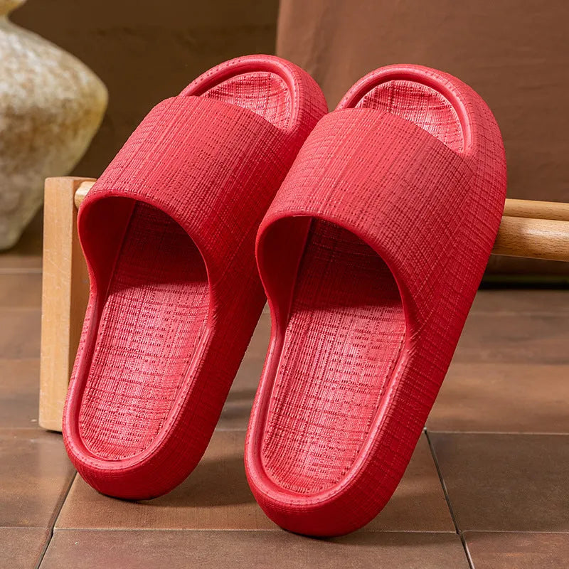 Unisex adult EVA flip flop slippers with toe ring and non-slip sole in multiple colours.