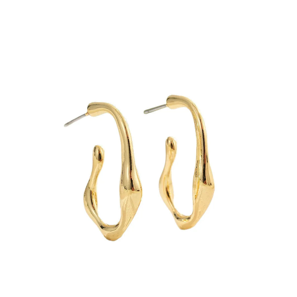 Gold irregular shaped minimalist dangle drop earrings for women with abstract geometric outline
