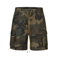 Men's green washed camouflage cotton cargo work shorts with multiple pockets on a mid-waist loose fit.