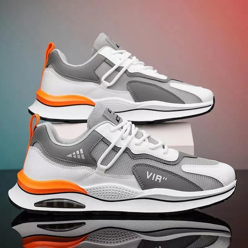 Men's grey breathable mesh running shoes with a round toe and lightweight EVA sole.
