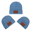 Knitted warm pullover hat in acrylic fibre with dome top and no brim, available in six colours and sizes S, M, L.