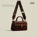 Brown retro-style women's messenger bag with square shape, shoulder strap, and visible front pocket.