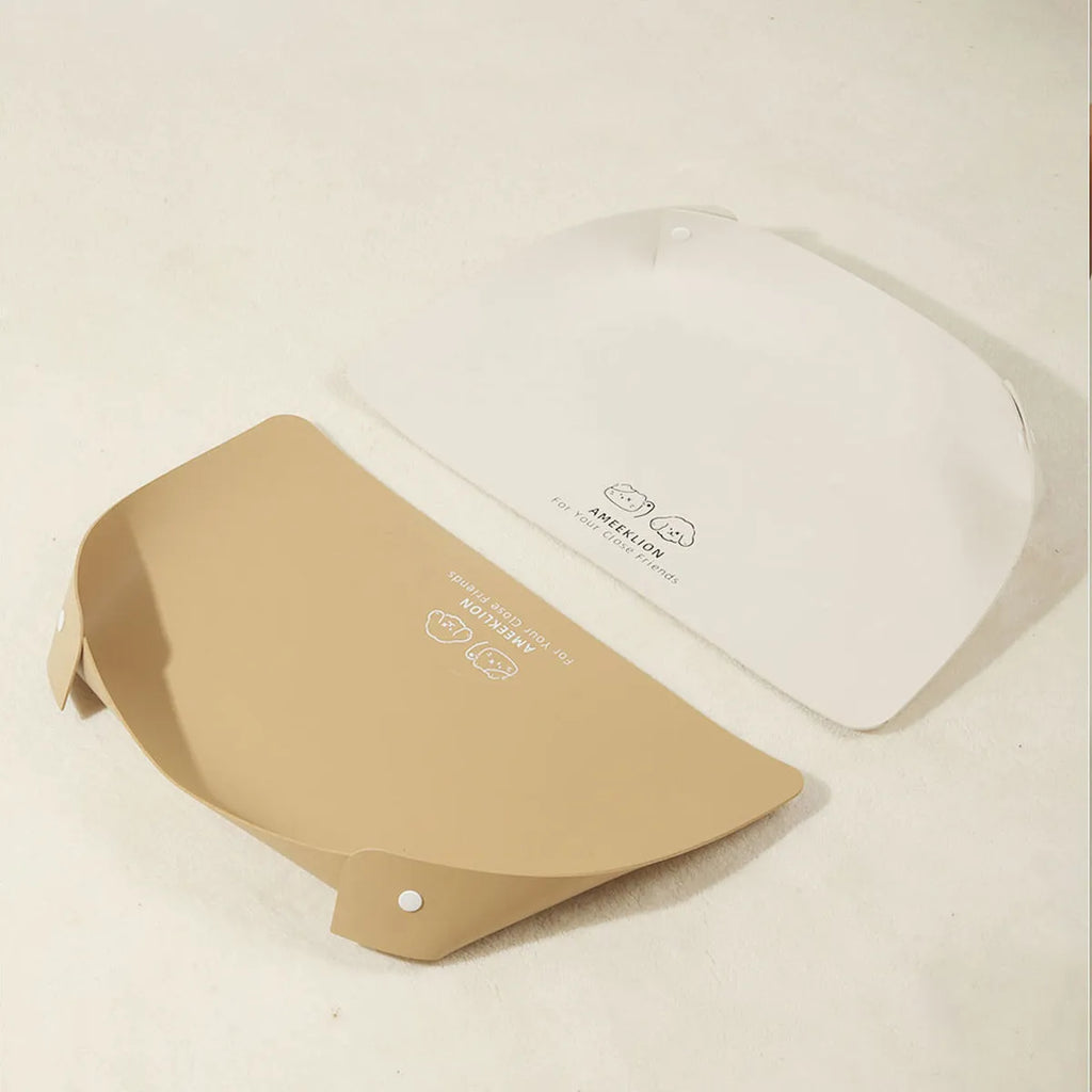 Anti-spill waterproof leather pet placemat in apricot colour under dog bowl