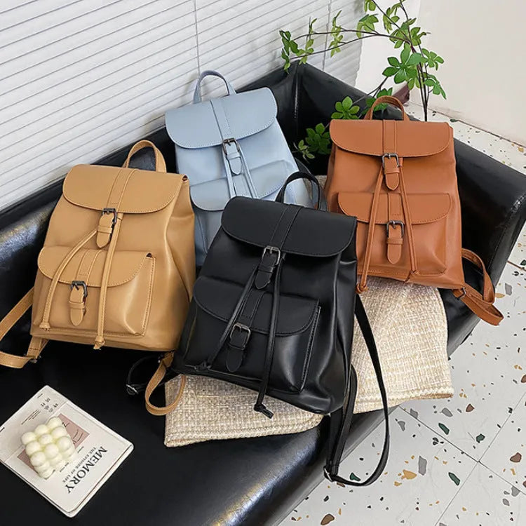 Retro college style small PU bucket bag in khaki with clamshell opening and multiple interior pockets