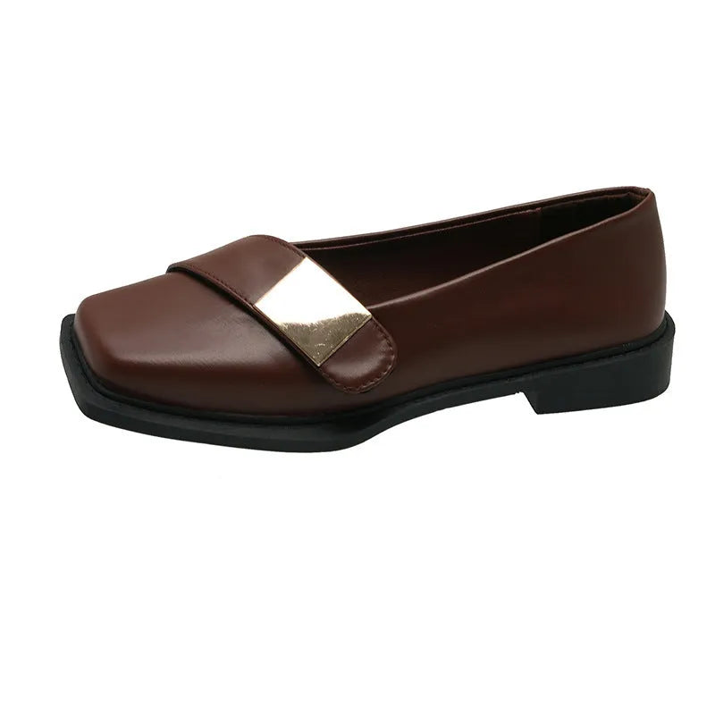 Women's beige artificial leather square toe flat-heeled slip-on ankle boots with a metal buckle.