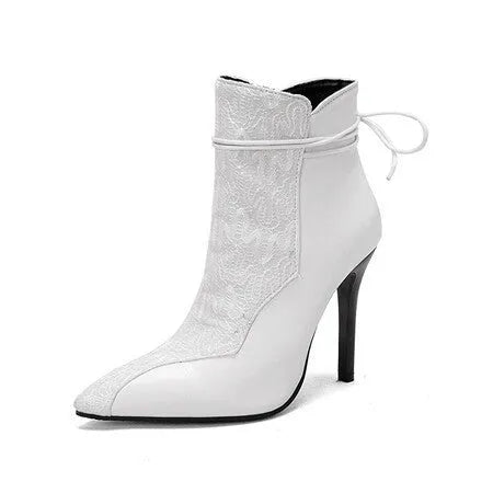 Women's pointed toe knight boots with 11cm stiletto heel, low tube ankle, and side zipper in black, brown, and white