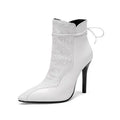 Women's pointed toe knight boots with 11cm stiletto heel, low tube ankle, and side zipper in black, brown, and white