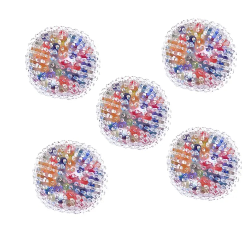 Rainbow TPR soft rubber stress ball 6cm diameter on white background OPP bag
