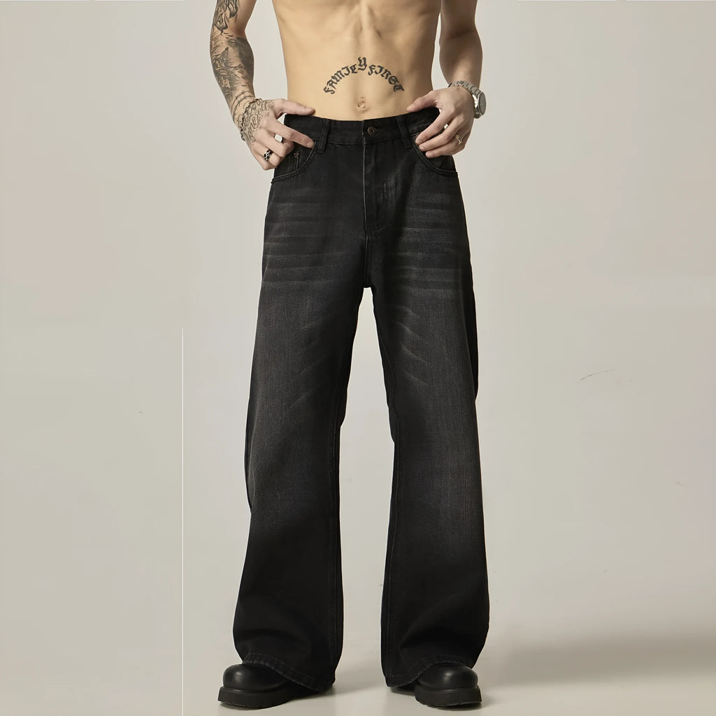 Black loose straight retro jeans with zipper fly on size chart background