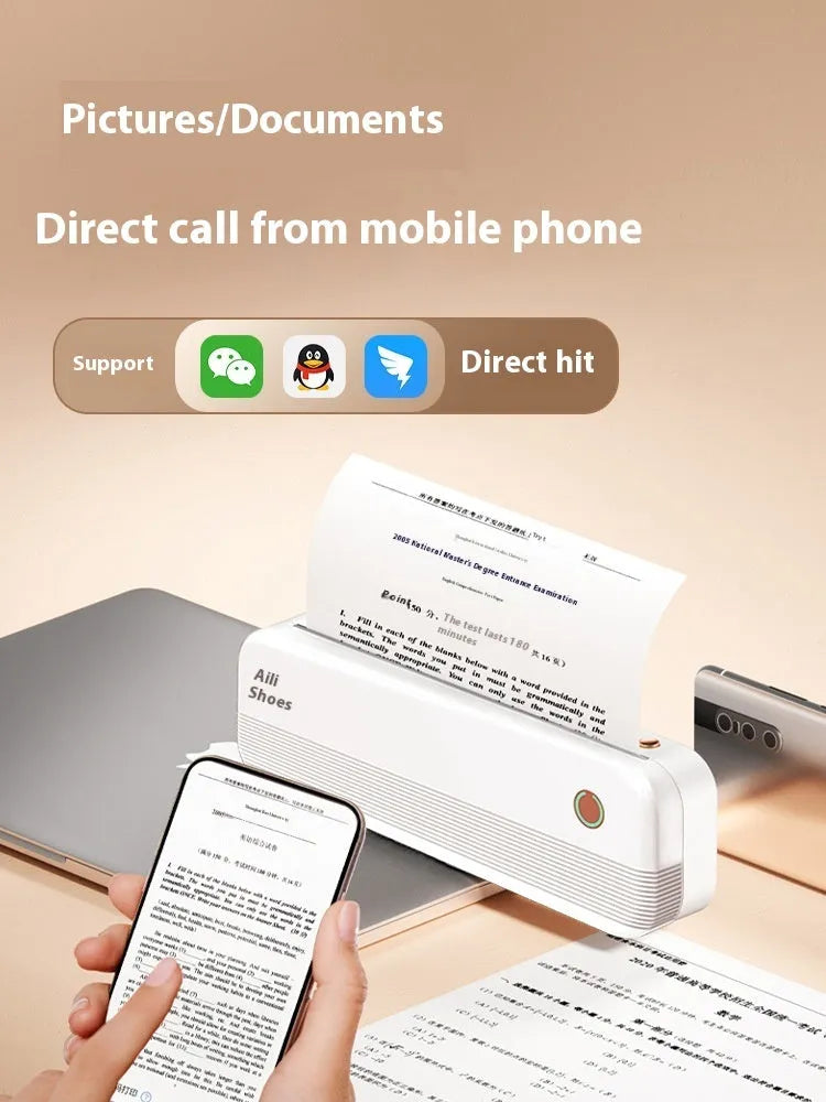 Small white portable thermal printer with USB port on a desk next to A4 paper.