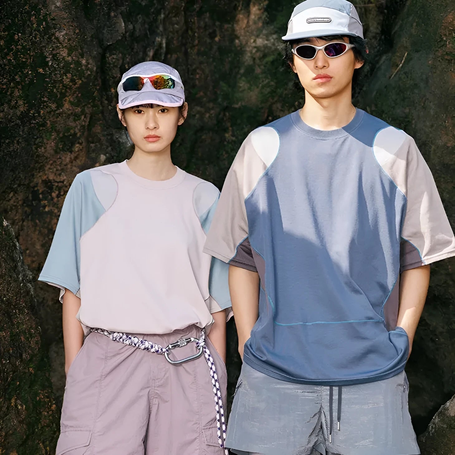 Men's loose blue short sleeve t-shirt with raglan sleeves on a hanger.