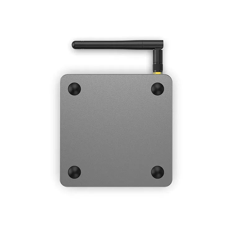 Android smart set-top box with remote control showing dual-band WiFi and Bluetooth connectivity options