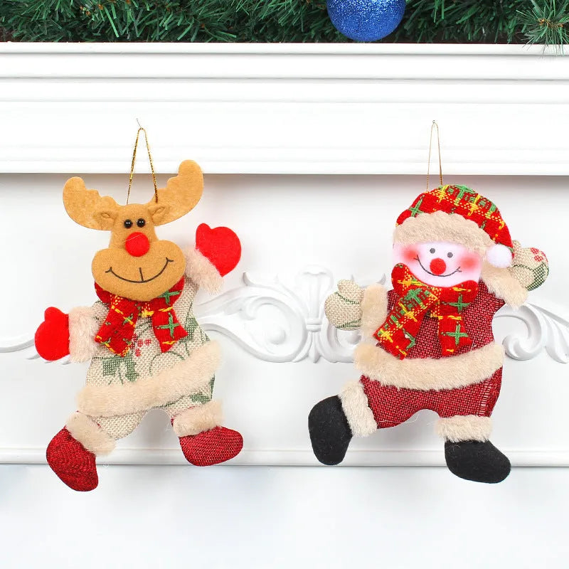 Christmas tree ornaments set with Santa, snowman, reindeer and bear figures in red and white scarves, golden balls and red bows.