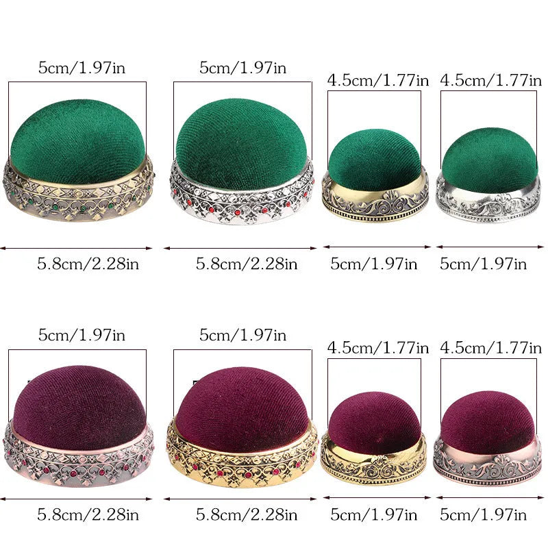 Retro needle ball head pin cushion with velvet cover and alloy insert on sewing table
