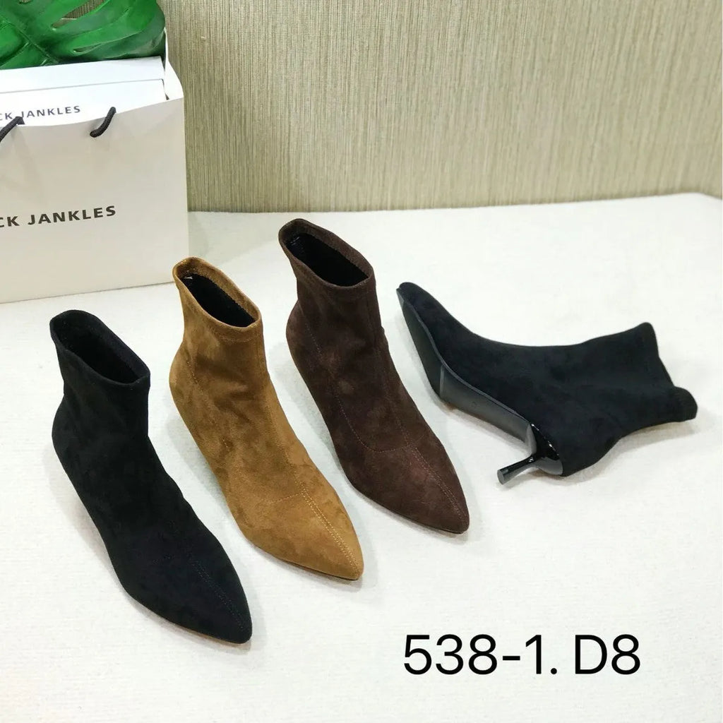 Women's black pointed-toe ankle boots with a stiletto heel and mid-calf sock length.