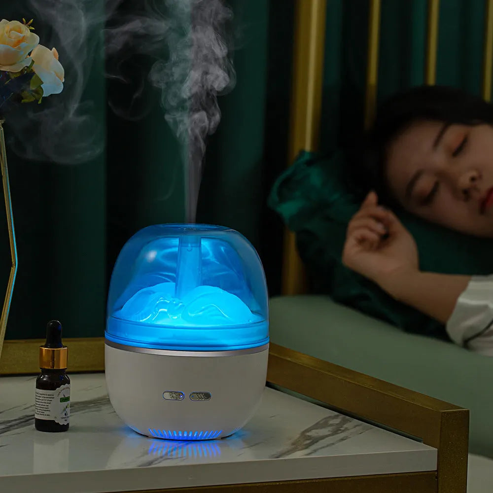 Green ultrasonic humidifier with colourful gradient light on desk showing heavy mist output