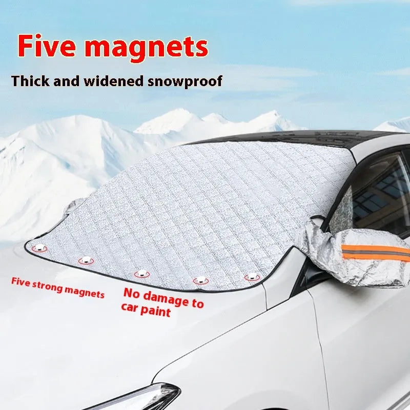 Large aluminium foil winter car cover for SUVs with reflective stripes and magnets on a vehicle windshield.