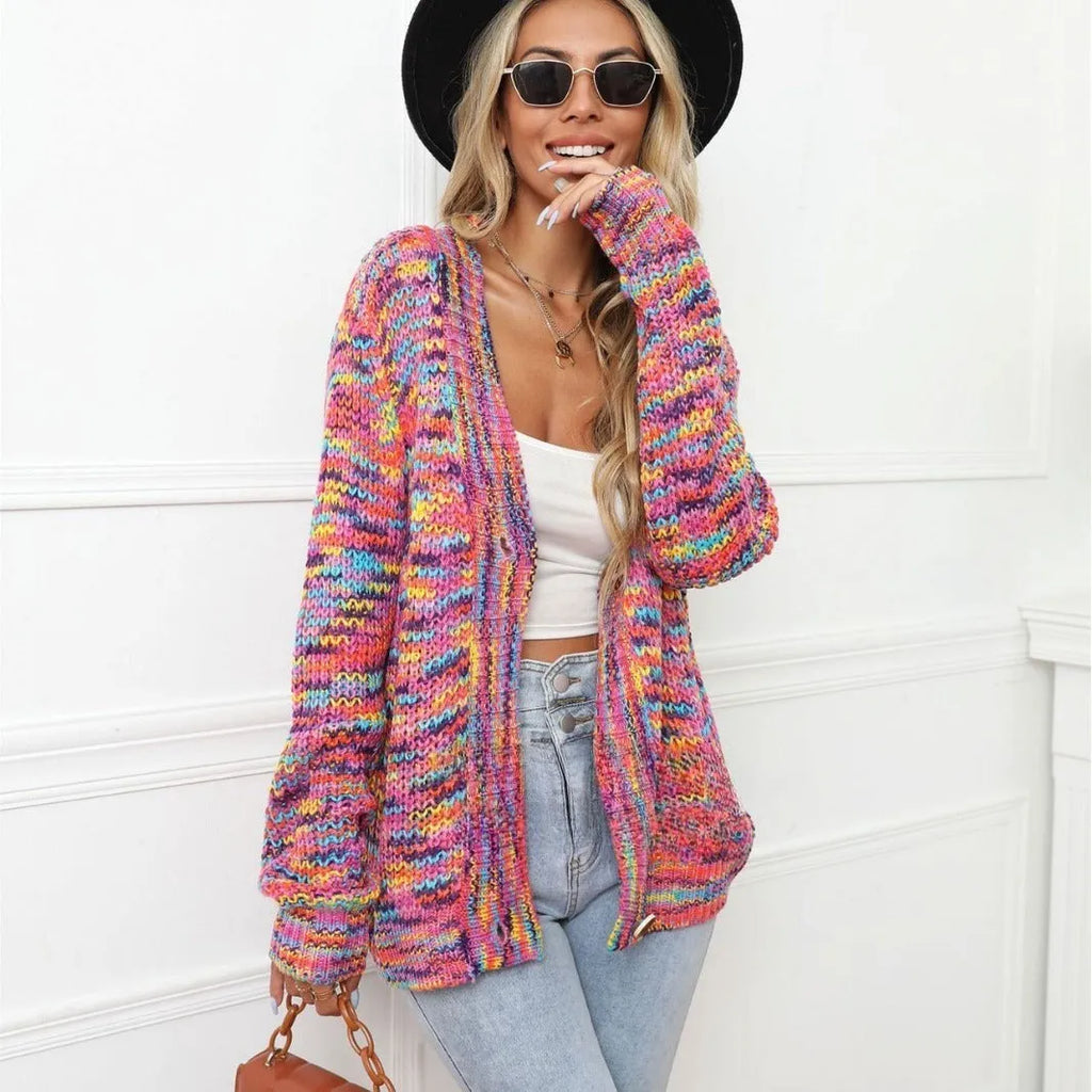 Rose Red rainbow striped loose-fit knitted cardigan coat on a hanger.