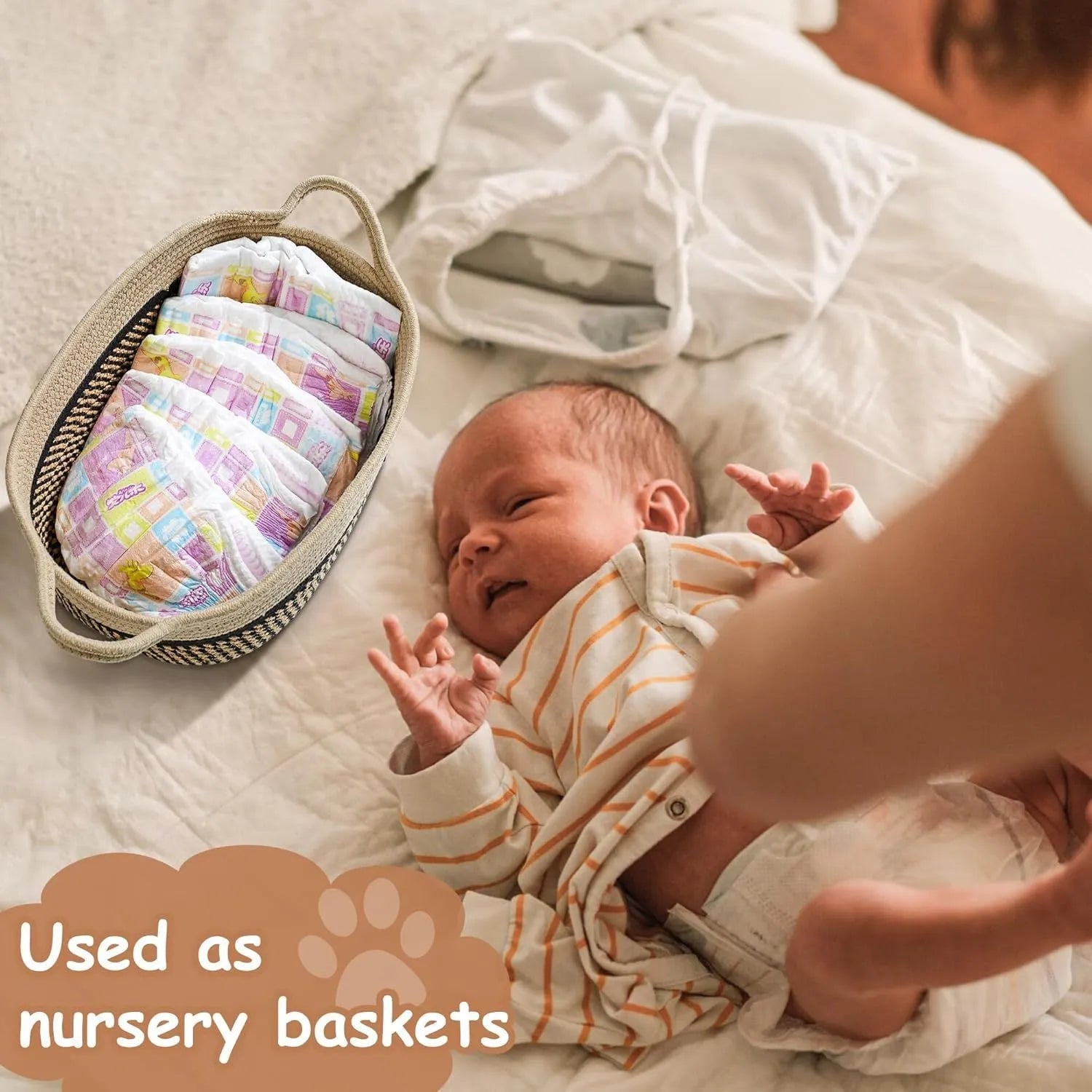 Handmade light beige woven cotton rope storage basket with a wooden handle.