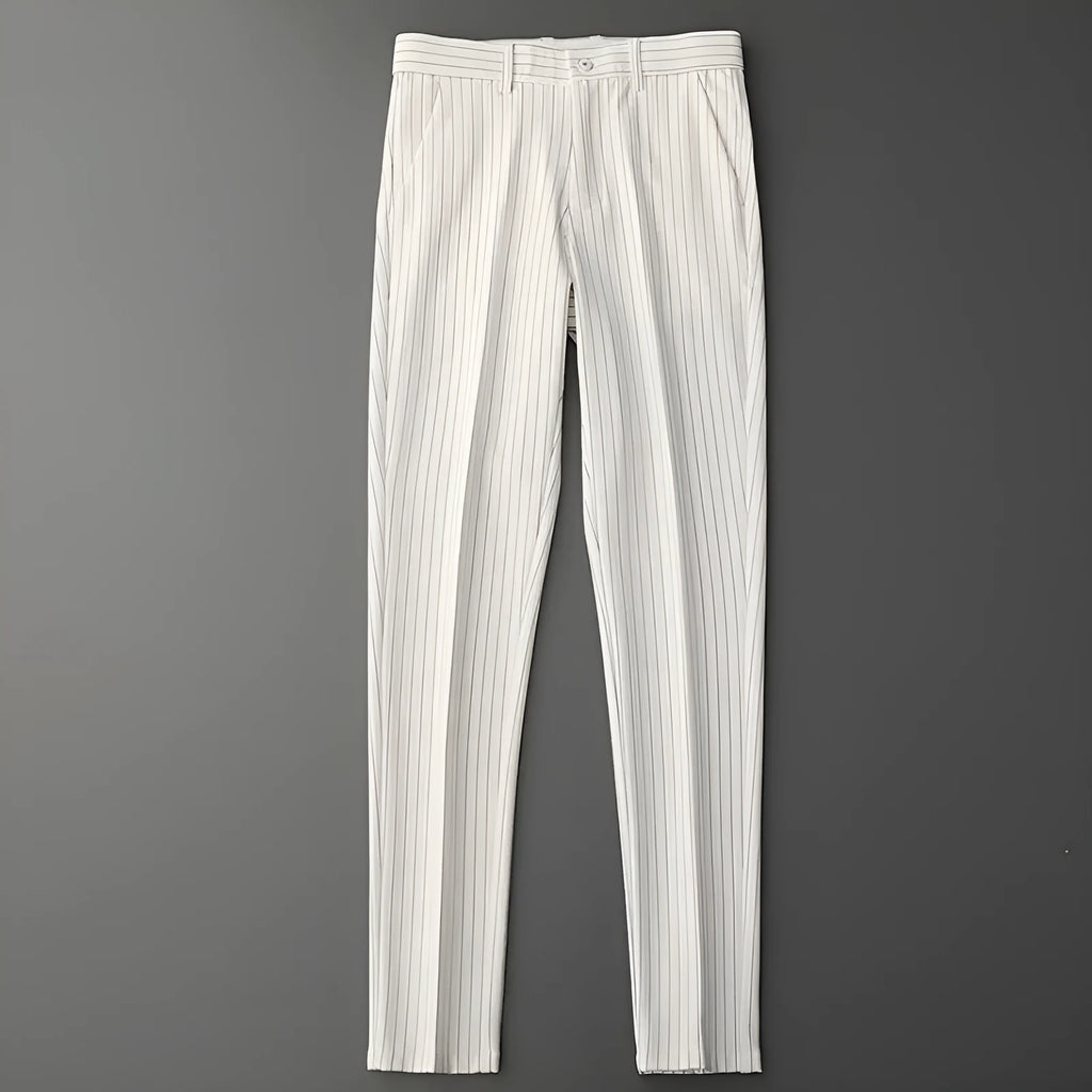 Men's loose-fitting striped casual trousers in black and white colours showing trousers and crop jeans styles