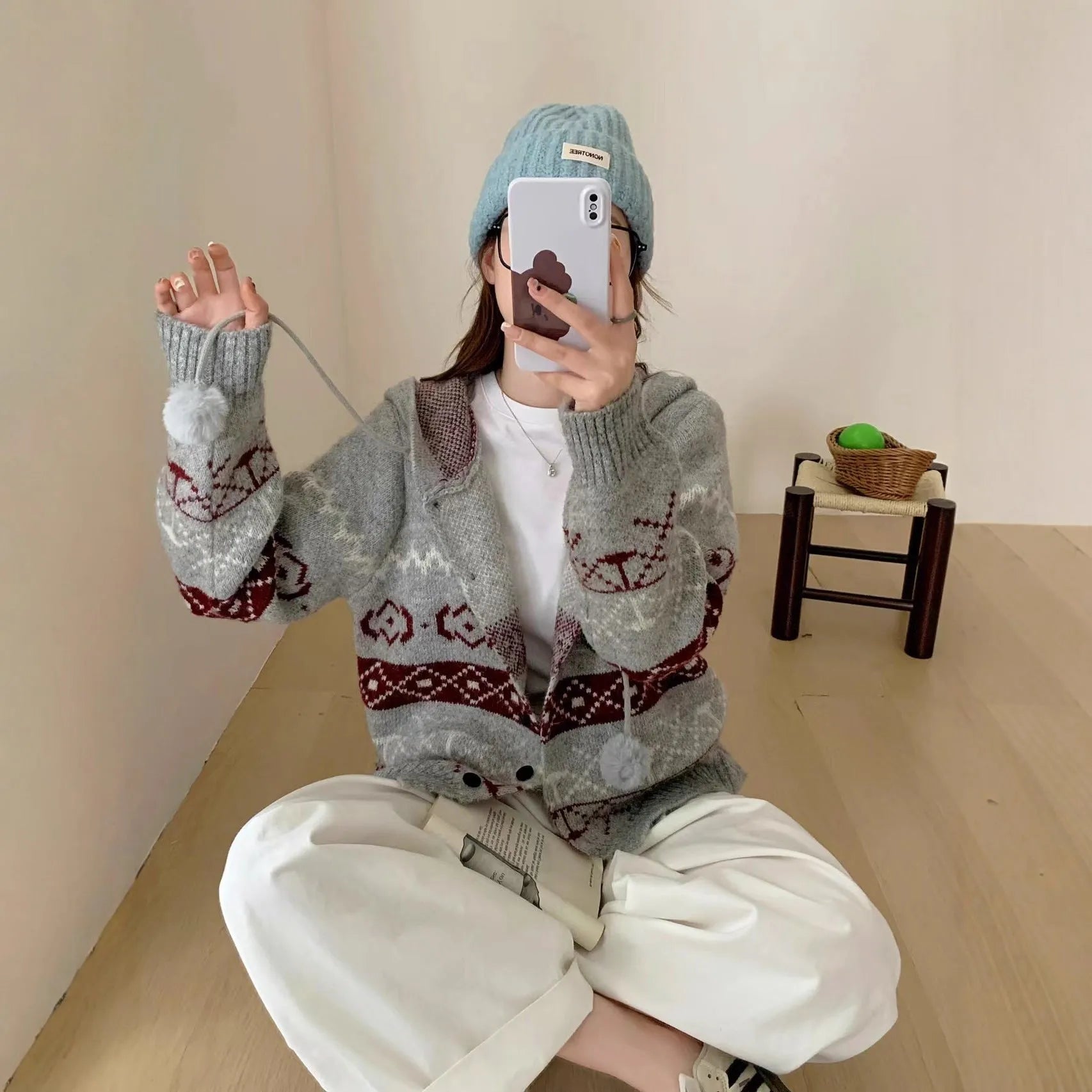 Loose fit brocade sweater coat for women in grey with geometric pattern.