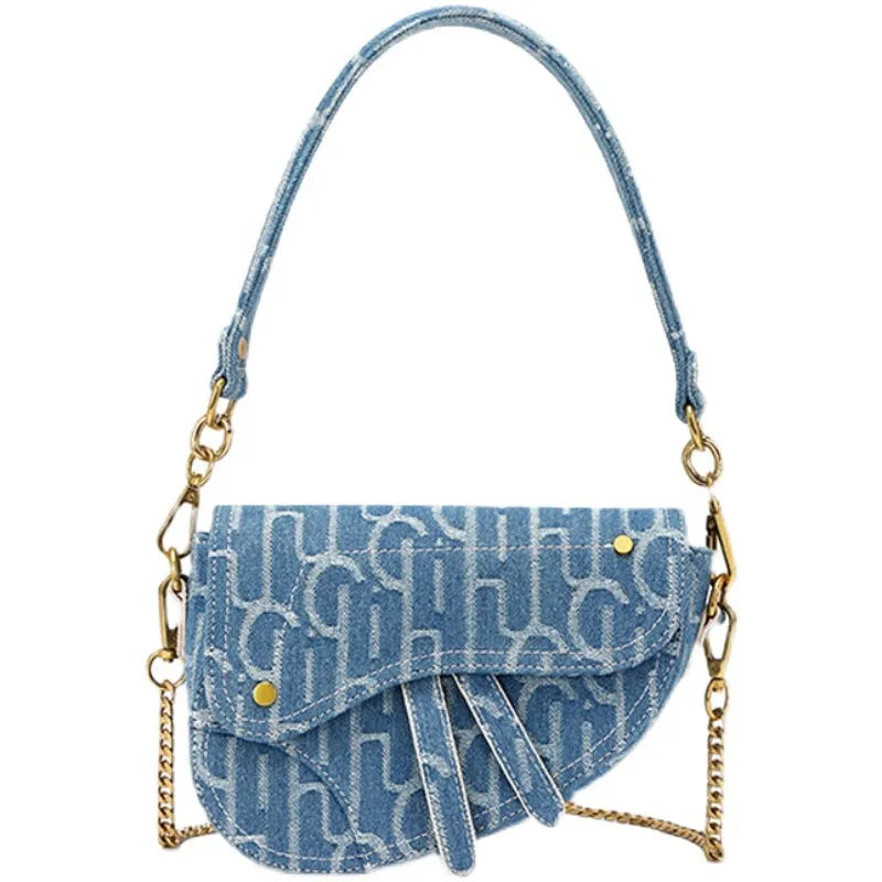Women's vintage denim saddle bag in blue cross body bag with soft PU surface and zip pocket interior
