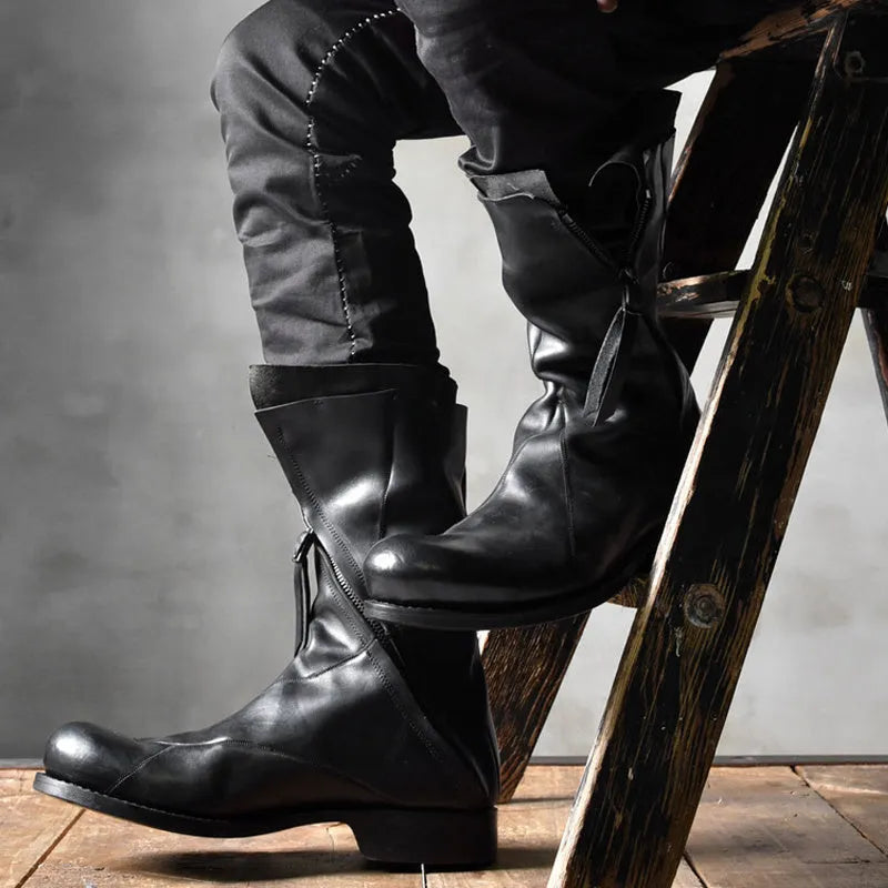 Black Japanese irregular deconstructed leather boots for men with high cylinder, round toe, thick bottom, and zipper closing.
