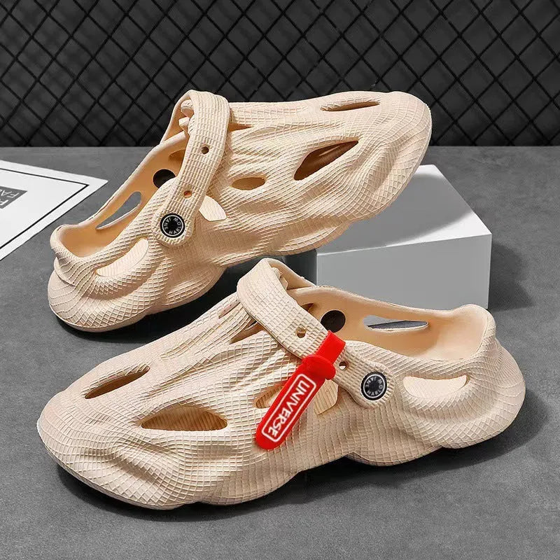 Grey closed-toe EVA coconut slippers on a beach background, showing frosted surface and injection moulded sole.