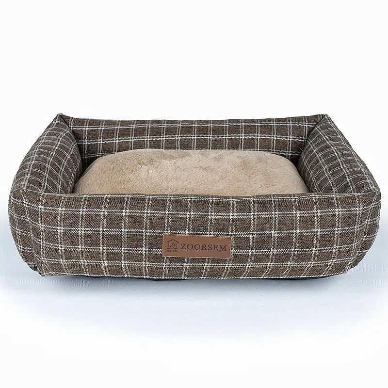 Square grey linen dog bed for a medium-sized dog.