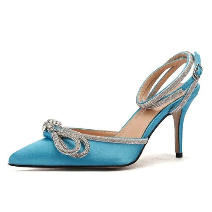Women's black stiletto heel sandals with a silk back bandage and buckle closure.
